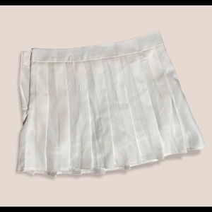 Grey OR white mini tennis skirts.
